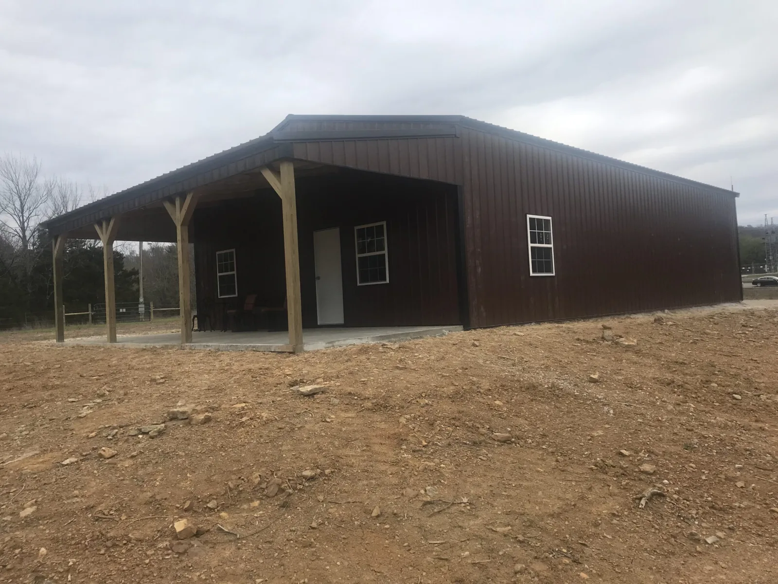 Barn with covered porch built by D.T. Construction