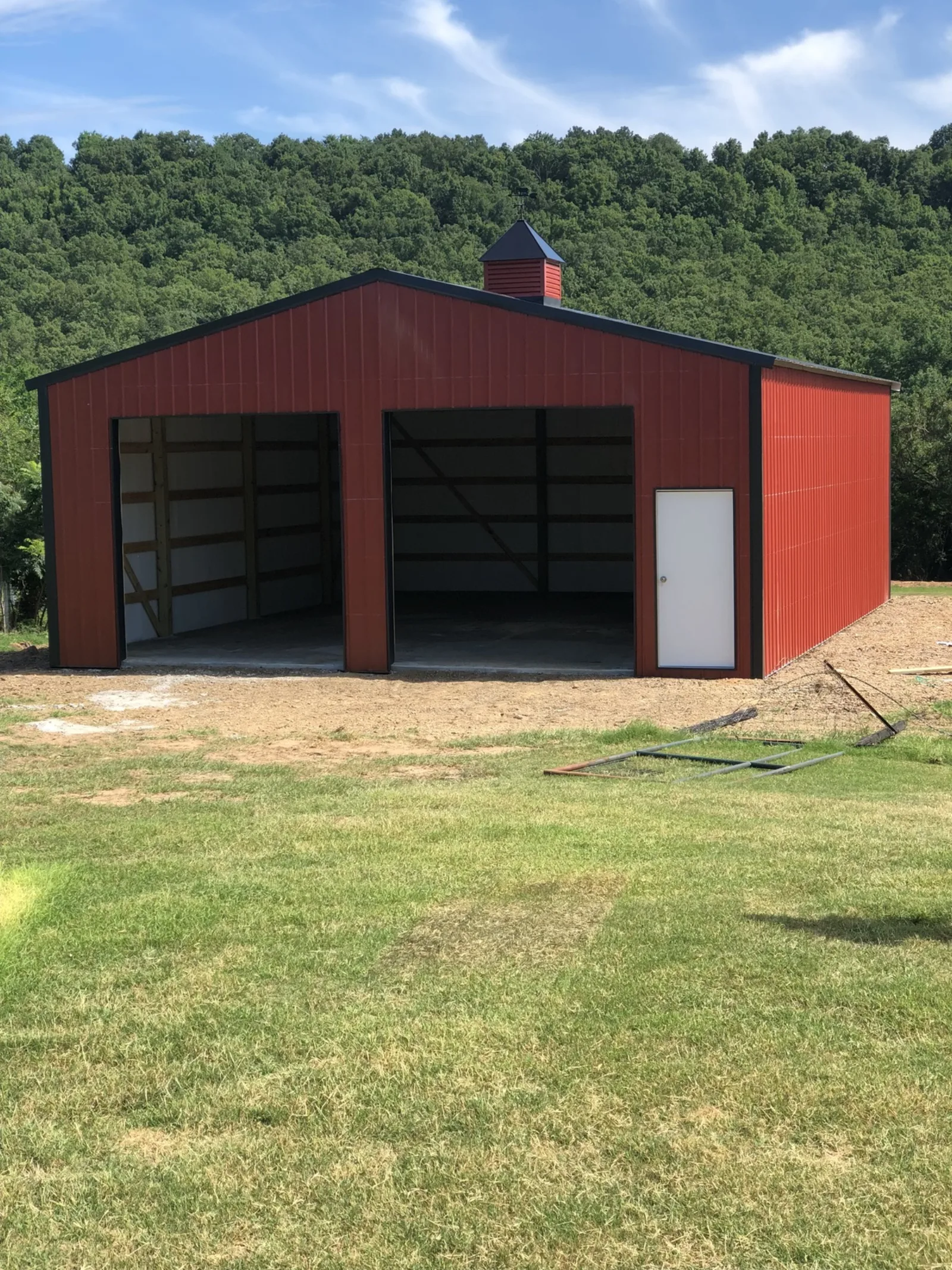 Red garage with cupola built by D.T. Construction