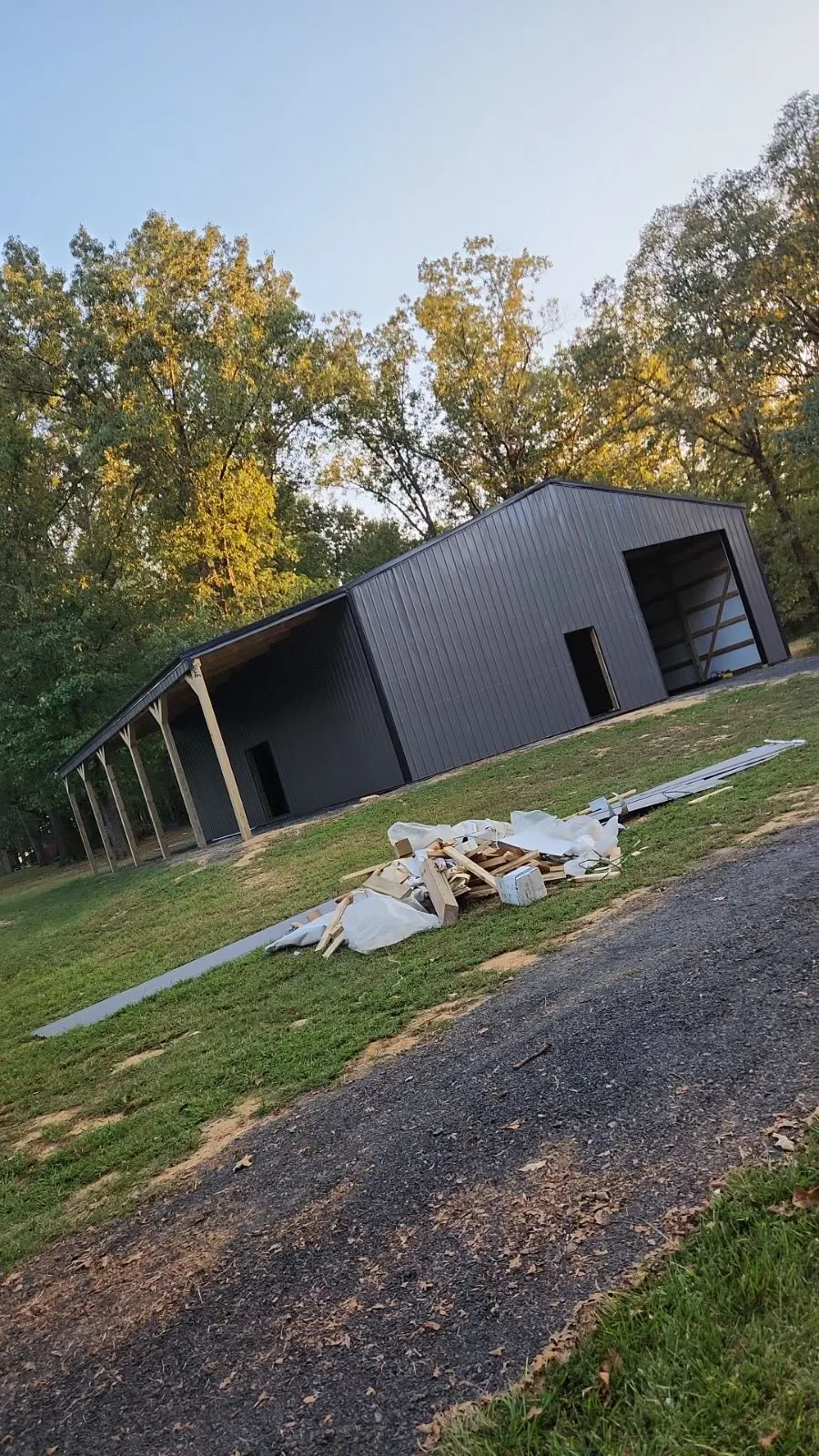 Post-frame building with lean-to by D.T. Construction