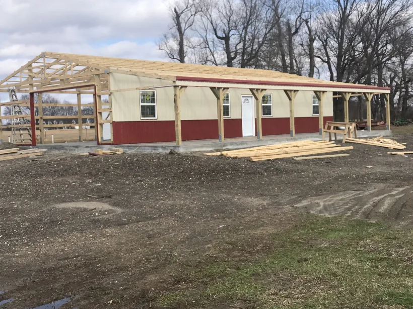 Post-frame building under construction by D.T. Construction
